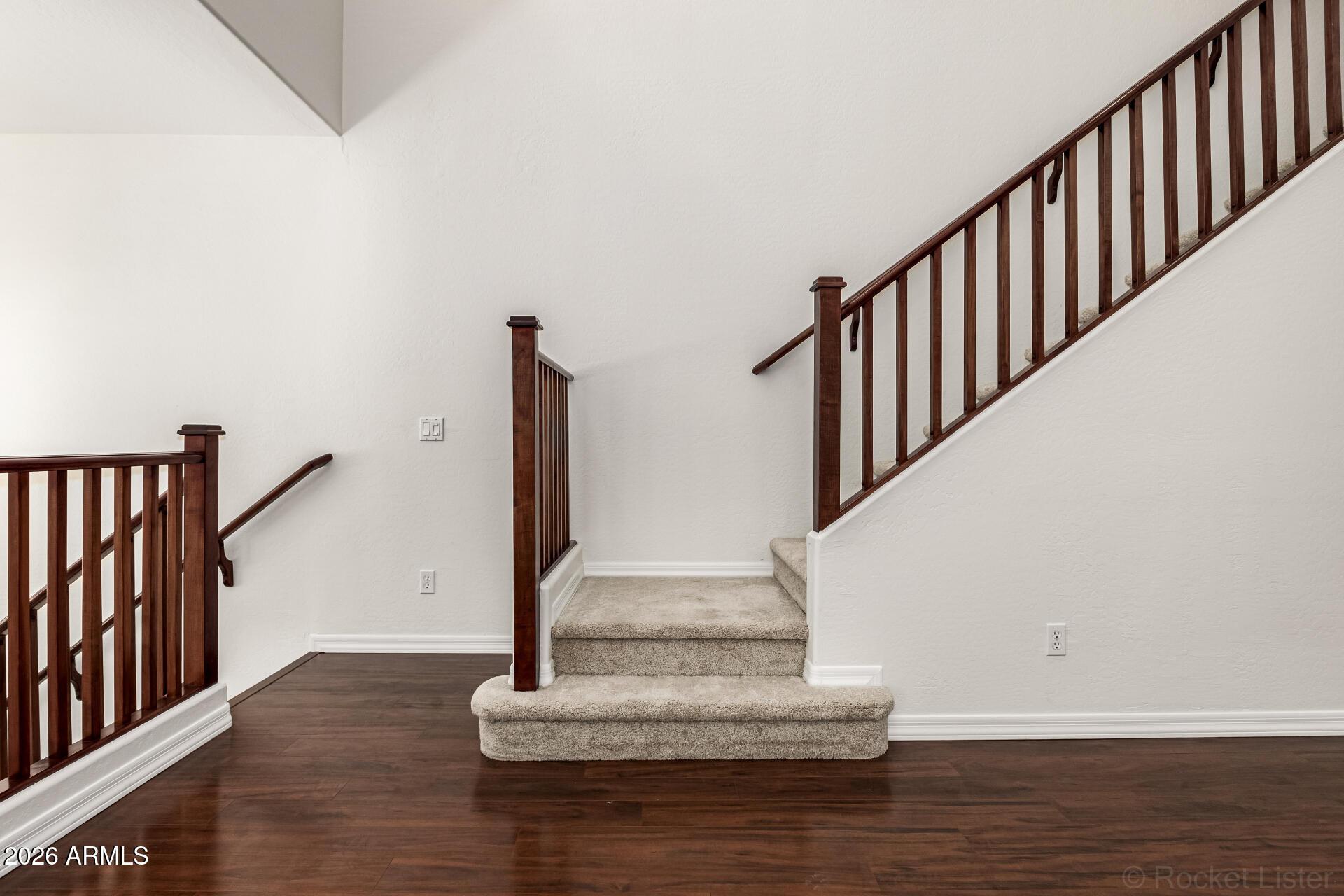 6940 East Cochise Road, Unit 1043 Paradise Valley, AZ 85253 - Photo 10 of 35 a view of staircase with white walls and a window