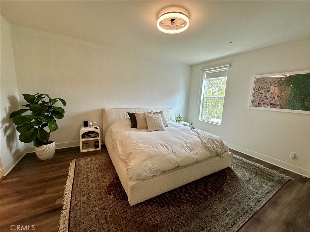 61 Gramercy Irvine, CA 92612 - Photo 11 of 33 a bedroom with a bed and window