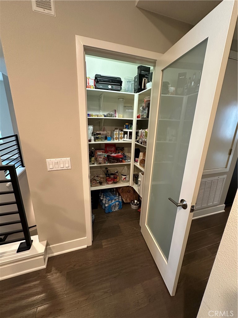 61 Gramercy Irvine, CA 92612 - Photo 17 of 33 walk in closet with wooden floor