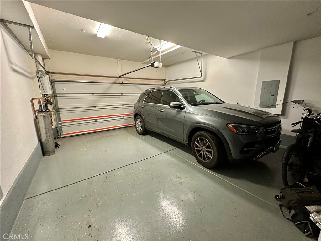 61 Gramercy Irvine, CA 92612 - Photo 22 of 33 a car parked in a garage