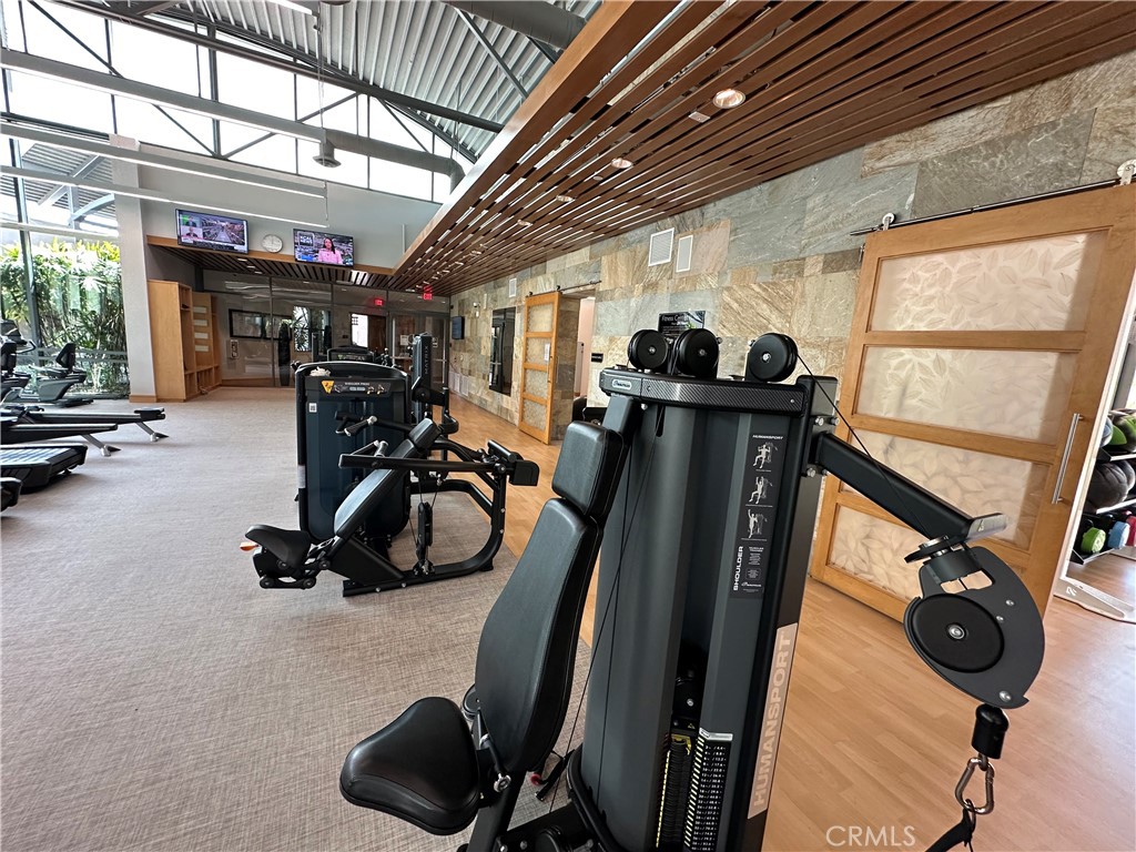61 Gramercy Irvine, CA 92612 - Photo 29 of 33 a view of a room with gym equipment