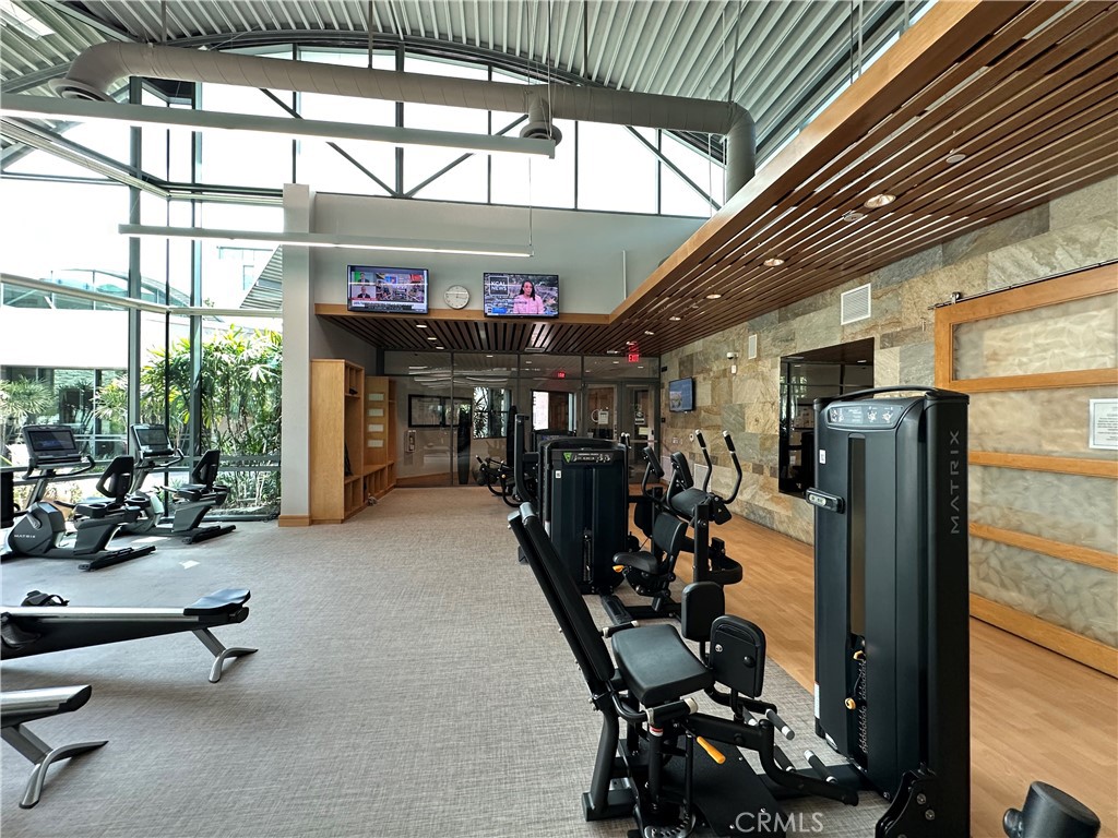 61 Gramercy Irvine, CA 92612 - Photo 30 of 33 a view of a room with gym equipment
