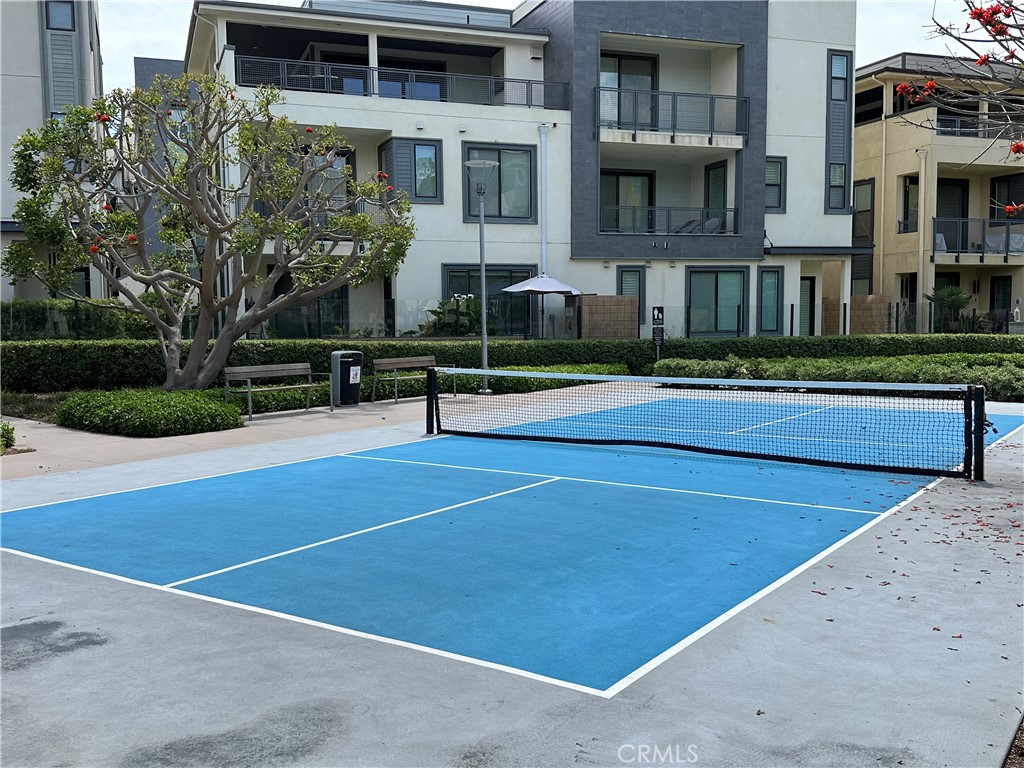 61 Gramercy Irvine, CA 92612 - Photo 32 of 33 a view of a building with a swimming pool