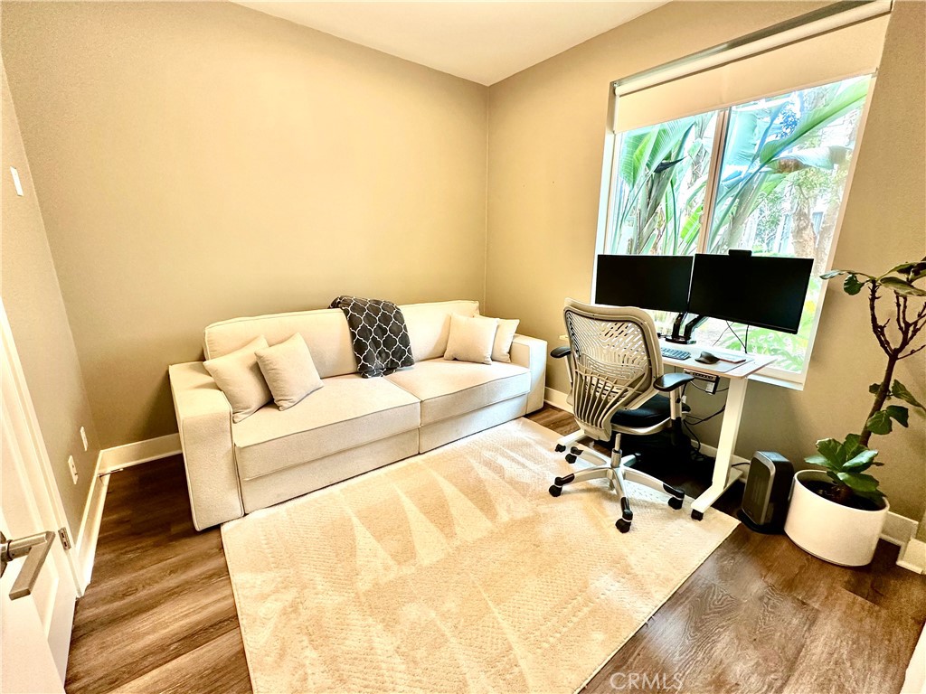 61 Gramercy Irvine, CA 92612 - Photo 8 of 33 a living room with a couch and a table