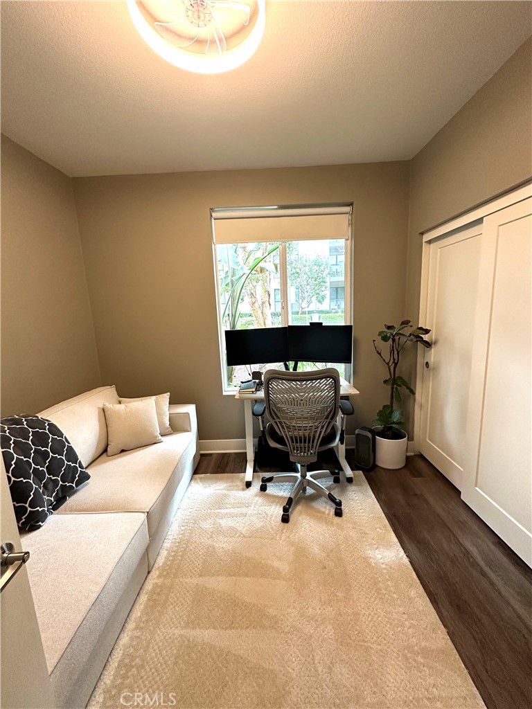 61 Gramercy Irvine, CA 92612 - Photo 9 of 33 a living room with furniture a piano and a window