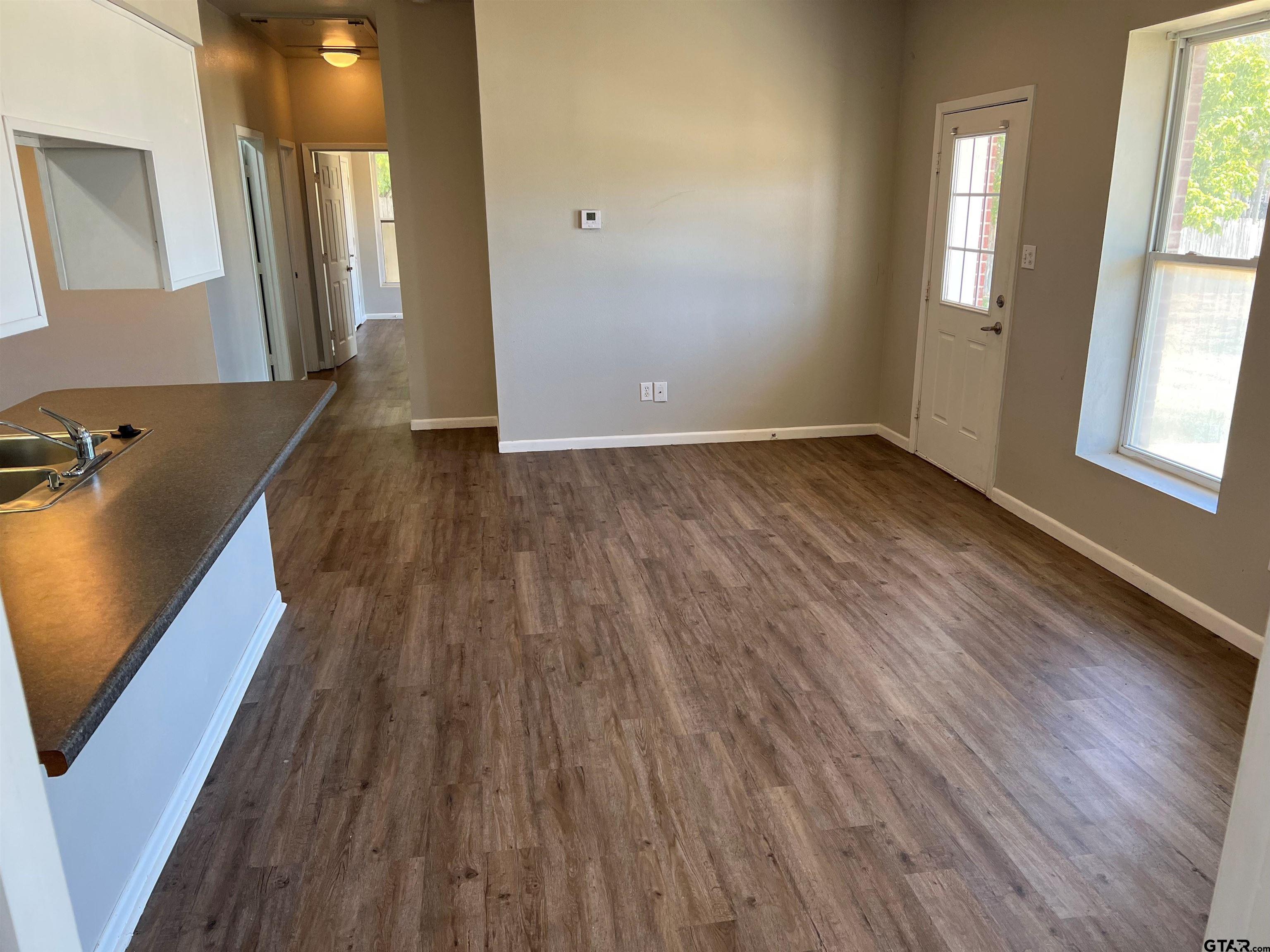 19038 FM 2493 Flint, TX 75762 - Photo 2 of 10 a view of a room with wooden floor and a window