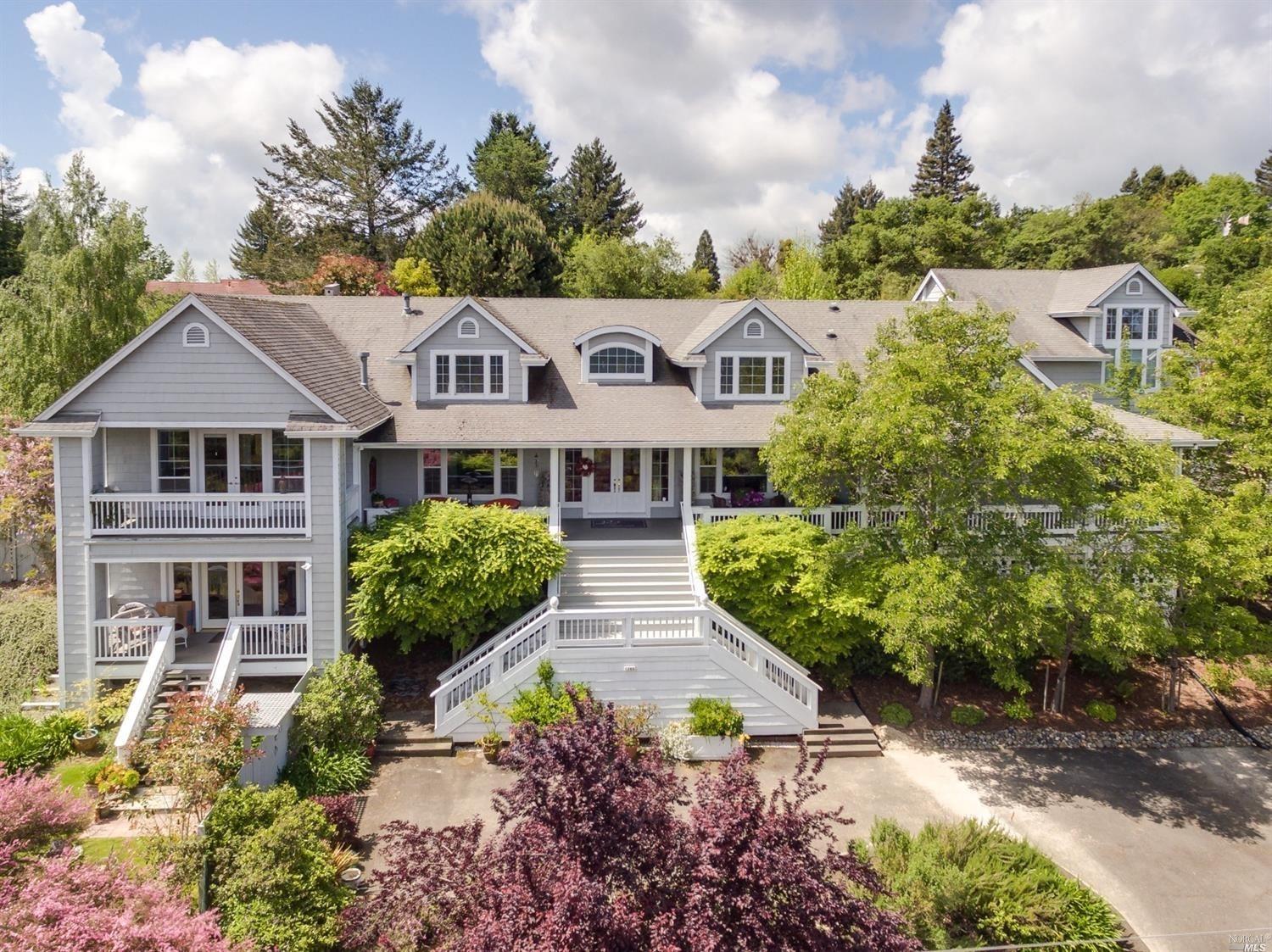 1200 Burnside Road Sebastopol, CA 95472 - Photo 1 of 1 a front view of a house with a garden