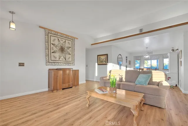 a bathroom with a sink a glass door shower and a mirror