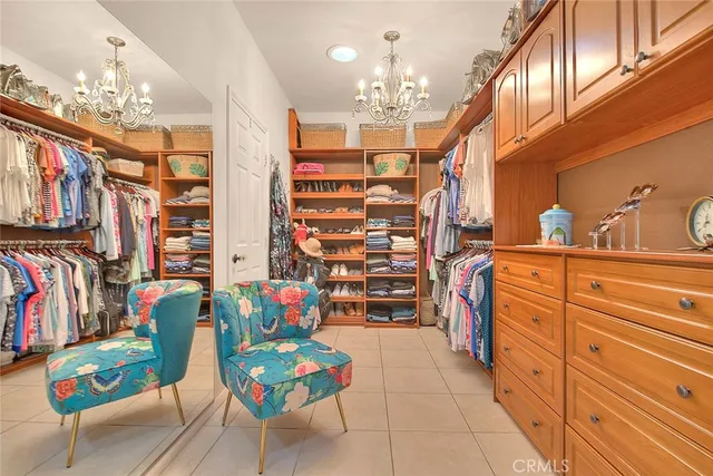 a view of a swimming pool with outdoor seating