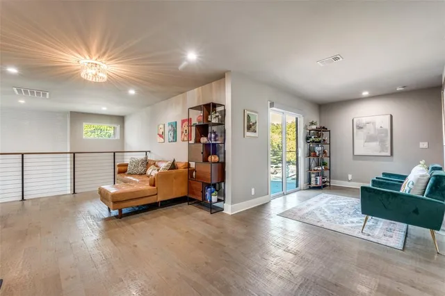 a spacious bedroom with a bed and furniture