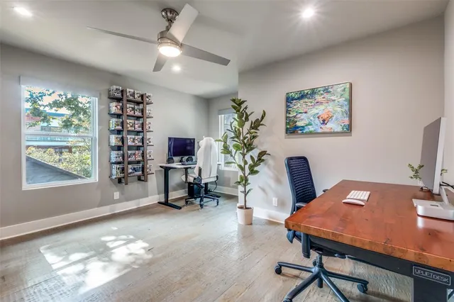 a workspace with furniture and window