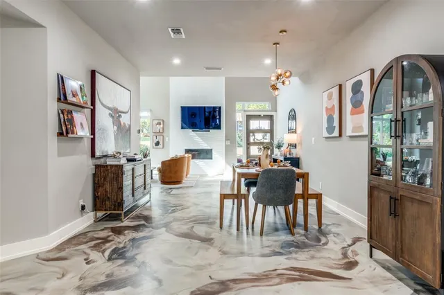 a workspace with furniture window and wooden floor