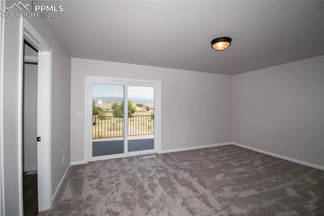 a view of balcony with furniture
