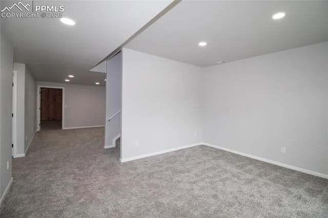 an empty room with a natural light