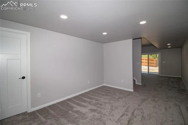 a bathroom with a granite countertop sink toilet a mirror and shower