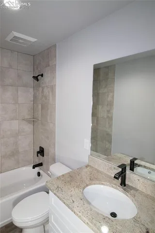 a view of kitchen and utility room