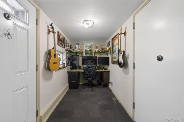 a kitchen with a stove cabinets and a refrigerator