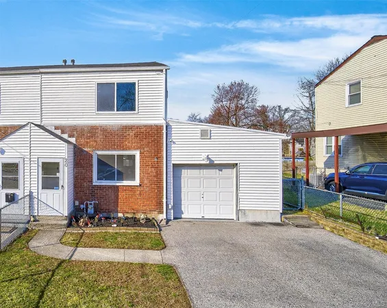 a view of a house with a patio