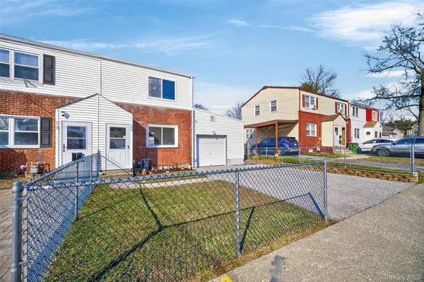 a front view of a house with swimming pool