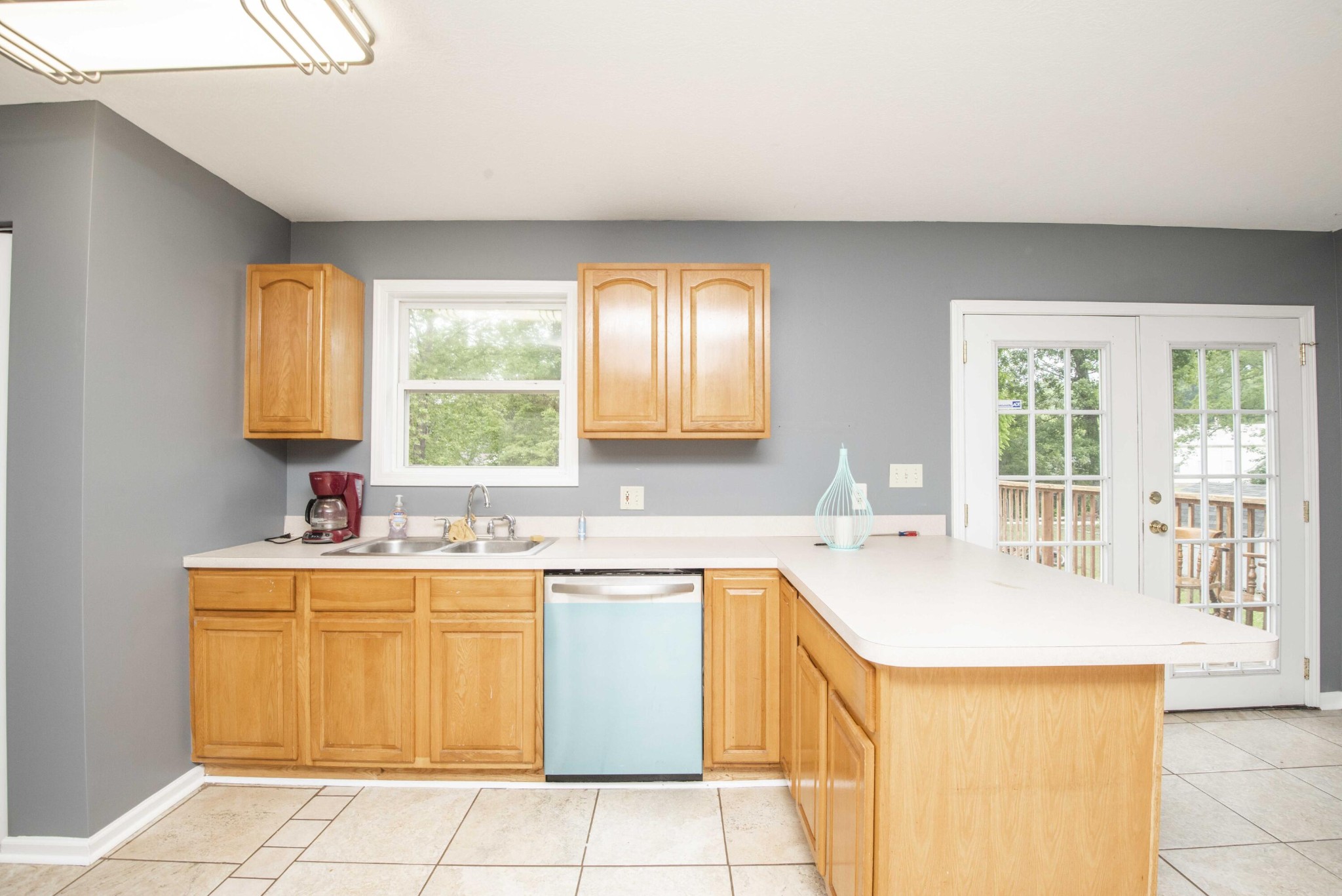 107 East Arrowwood Road Oak Ridge, TN 37830 - Photo 12 of 25 a kitchen with a sink and cabinets