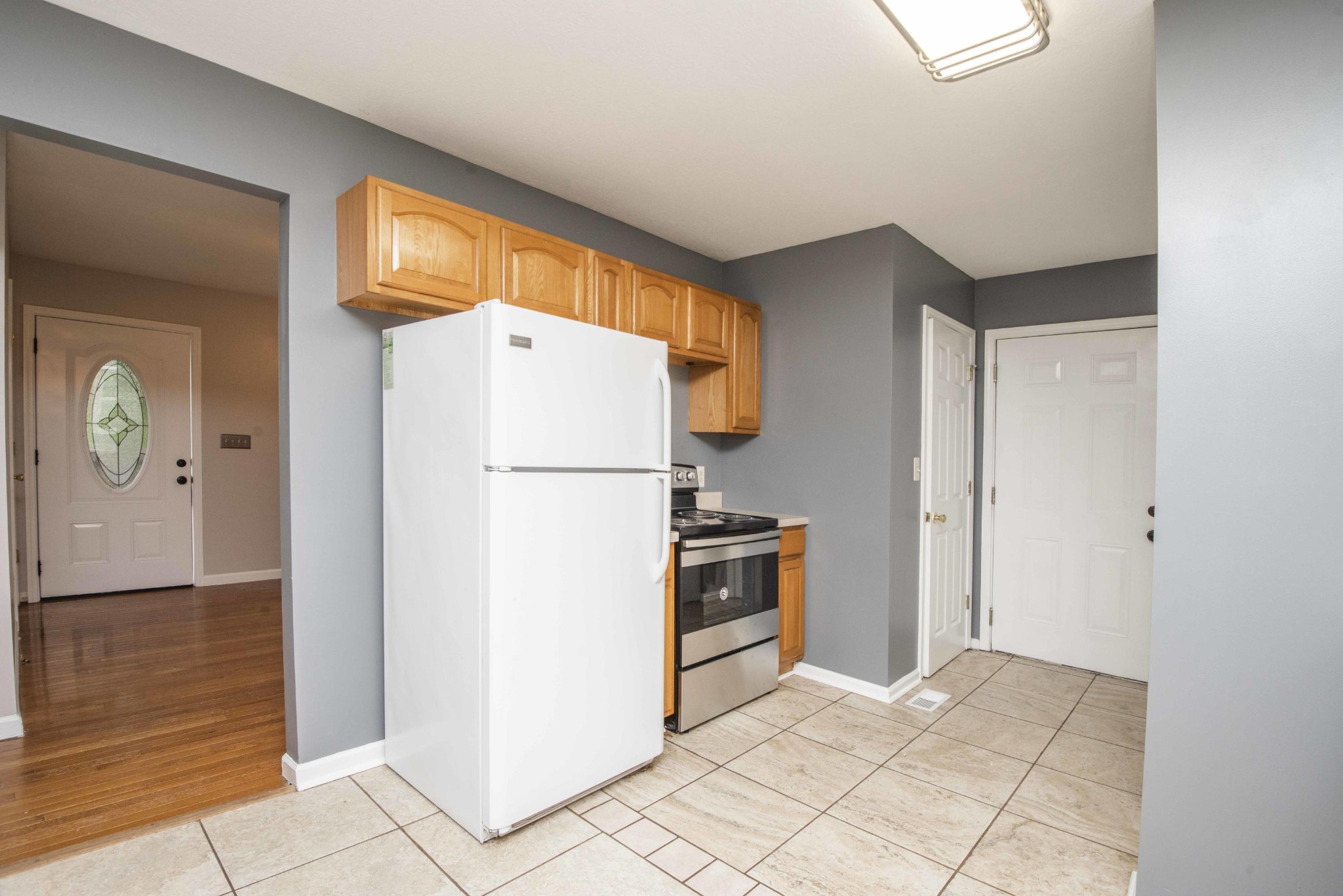 107 East Arrowwood Road Oak Ridge, TN 37830 - Photo 14 of 25 a view of a kitchen with refrigerator and cabinet
