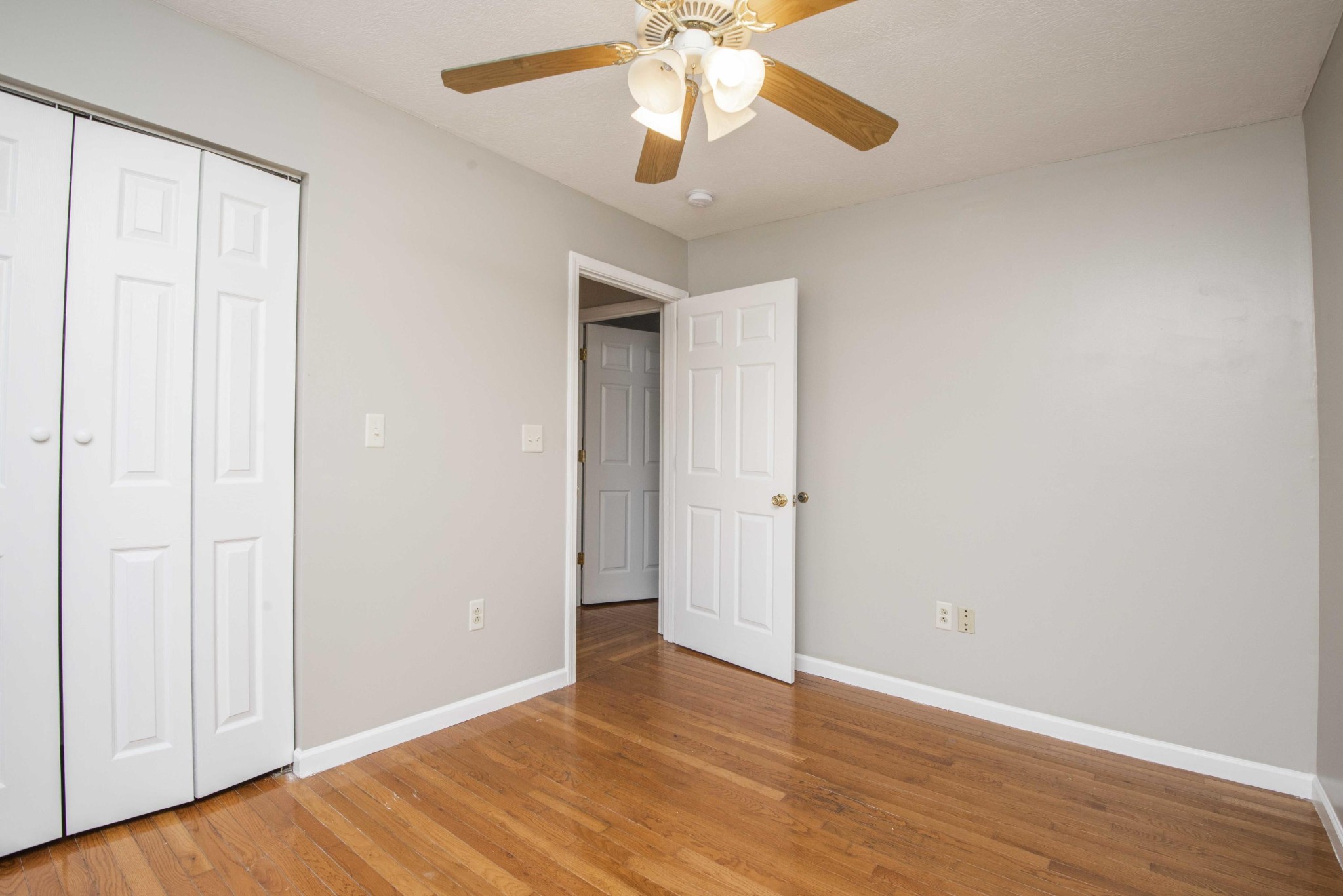 107 East Arrowwood Road Oak Ridge, TN 37830 - Photo 20 of 25 a view of an empty room with wooden floor