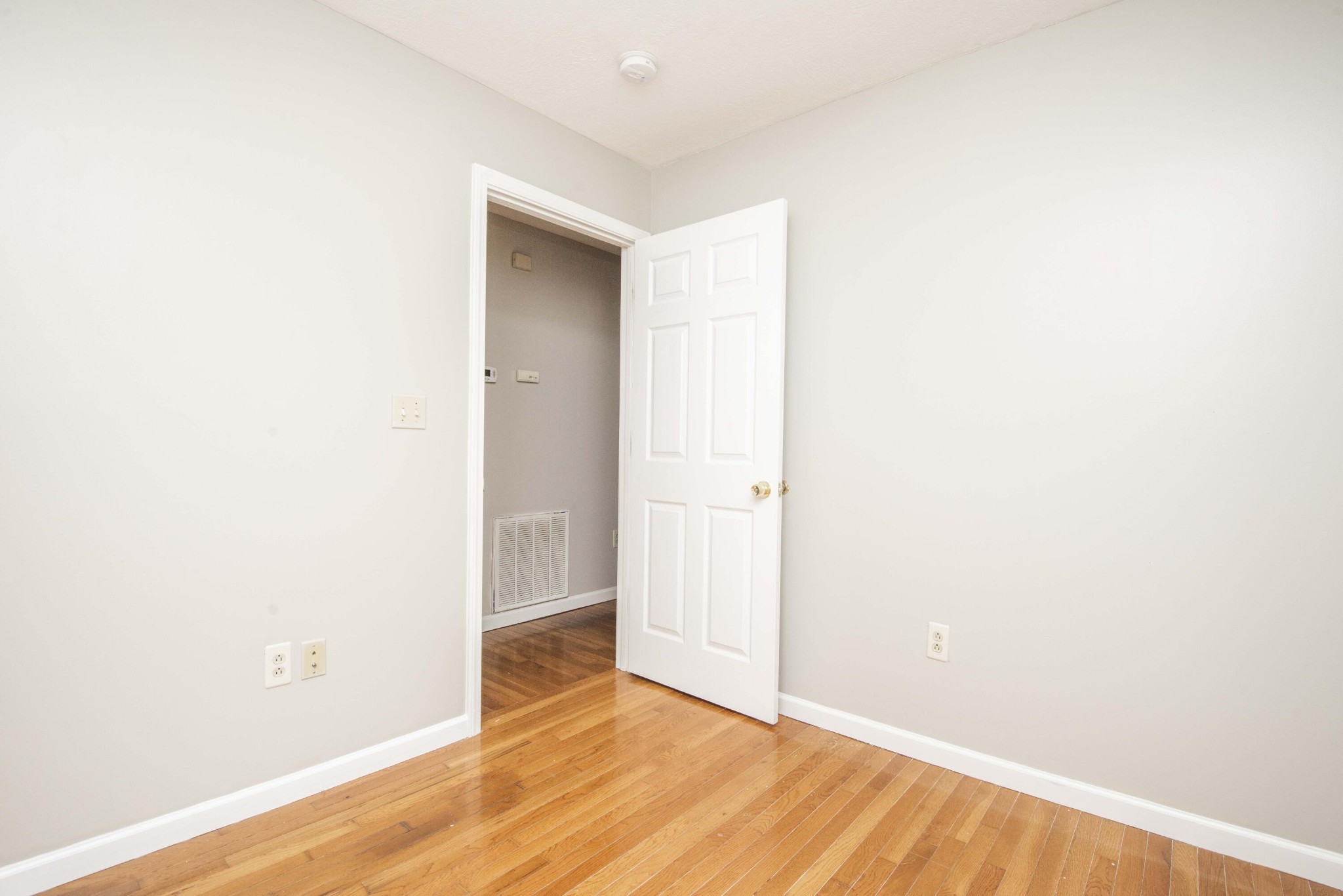107 East Arrowwood Road Oak Ridge, TN 37830 - Photo 25 of 25 a view of an empty room with wooden floor