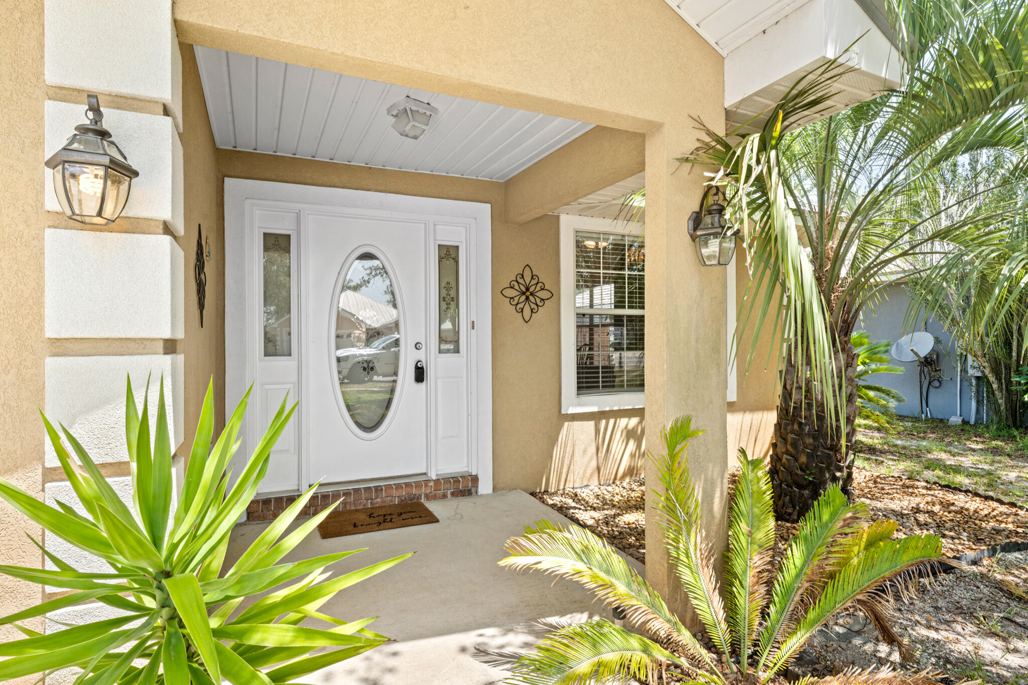 90 South Harborview Road Santa Rosa Beach, FL 32459 - Photo 3 of 33 a front view of a house with a yard