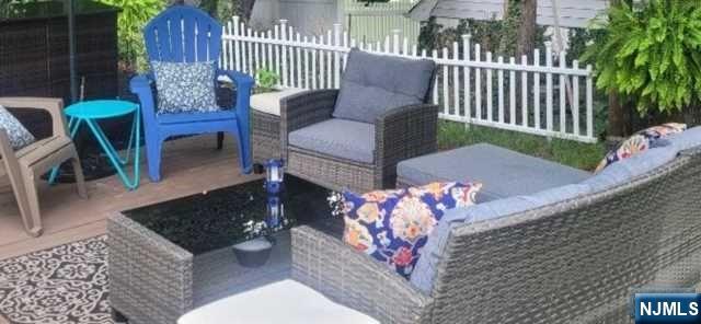 295 Lincoln Avenue Ridgewood, NJ 07450 - Photo 13 of 17 a view of a porch with furniture