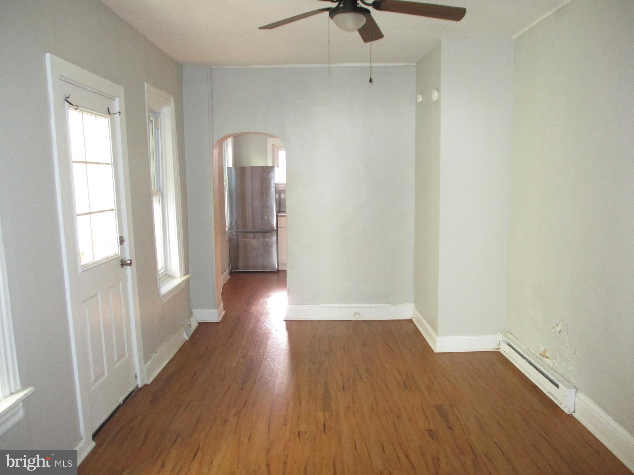 1242 Muhlenberg Street Reading, PA 19602 - Photo 4 of 18 a view of a room with wooden floor