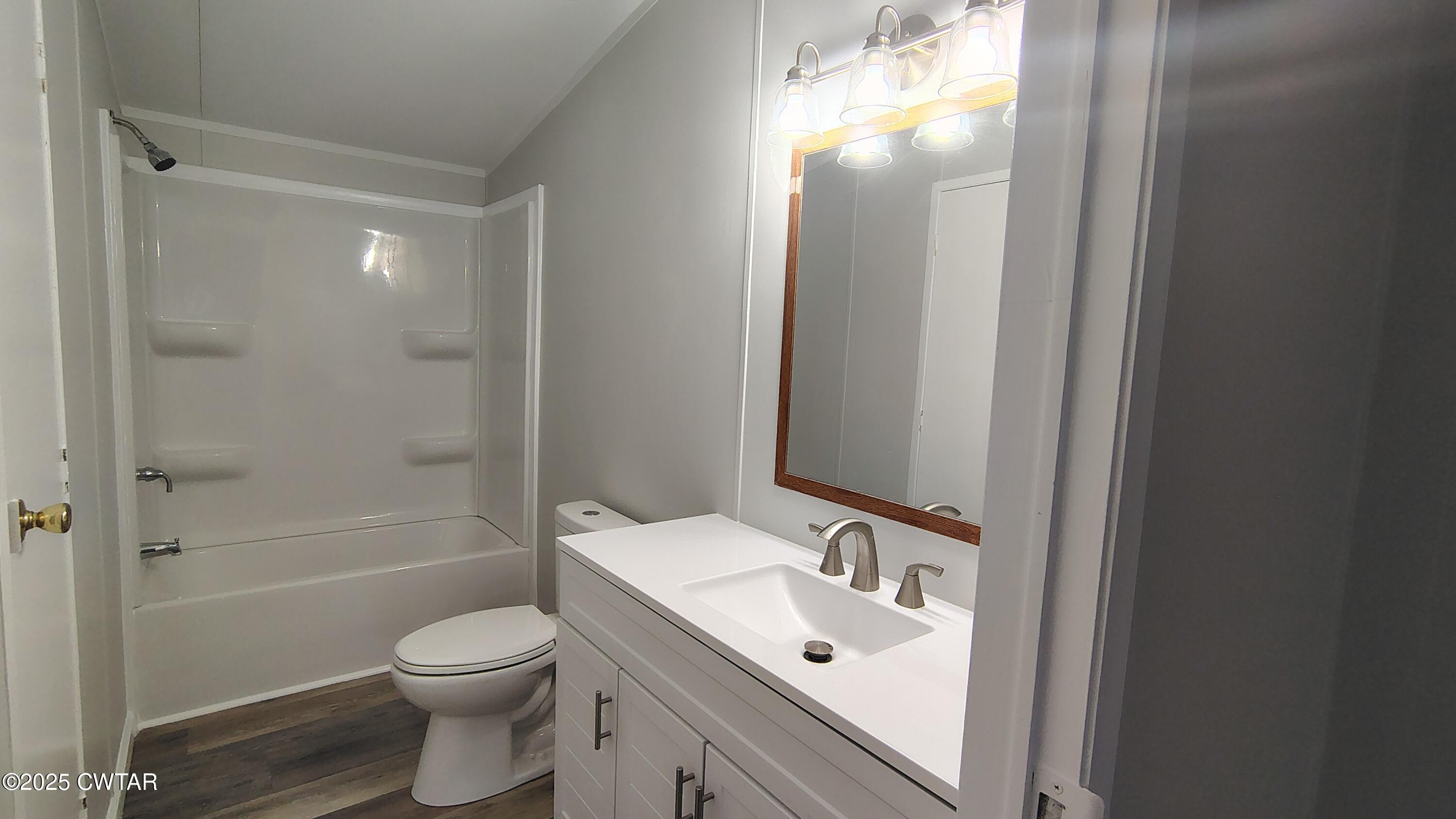 420 South Main Street Ridgely, TN 38080 - Photo 6 of 13 a bathroom with a sink toilet and shower