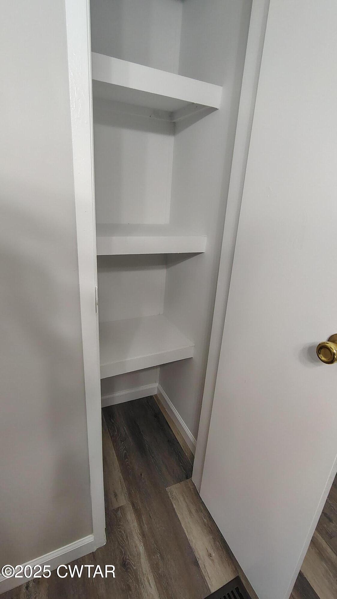 420 South Main Street Ridgely, TN 38080 - Photo 7 of 13 a view of walk in closet with empty racks