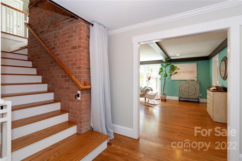 4301 Eagle Lake Drive Charlotte, NC 28217 - Photo 11 of 41 a view of entryway and hall with wooden floor