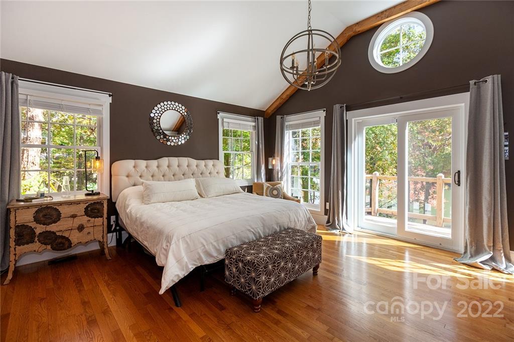4301 Eagle Lake Drive Charlotte, NC 28217 - Photo 18 of 41 a spacious bedroom with a bed and a large window