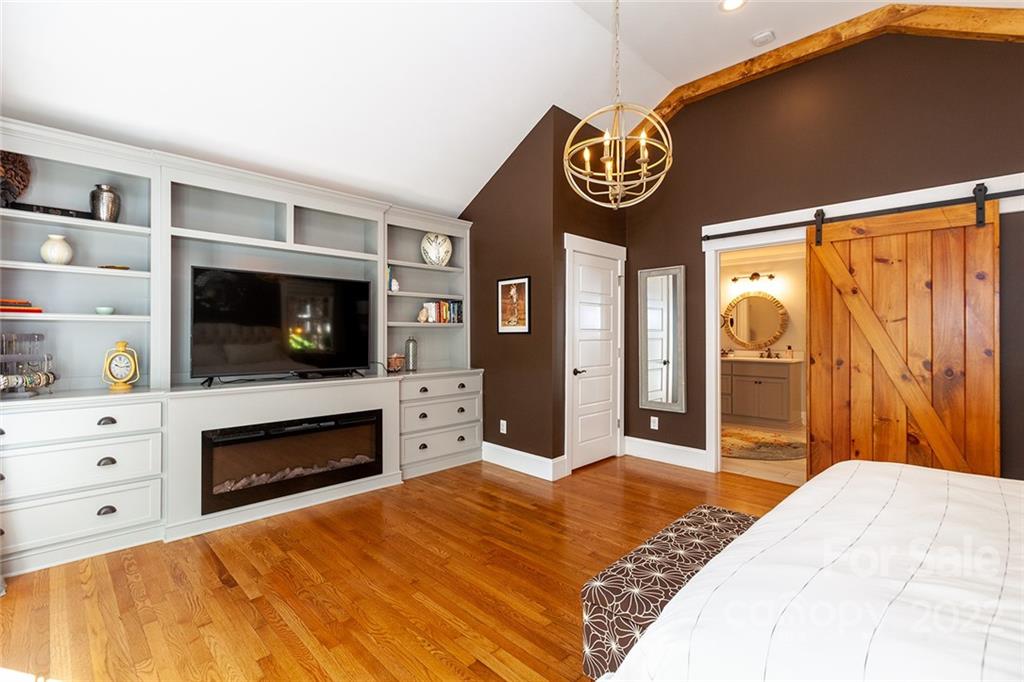 4301 Eagle Lake Drive Charlotte, NC 28217 - Photo 19 of 41 a bedroom with a bed and a television