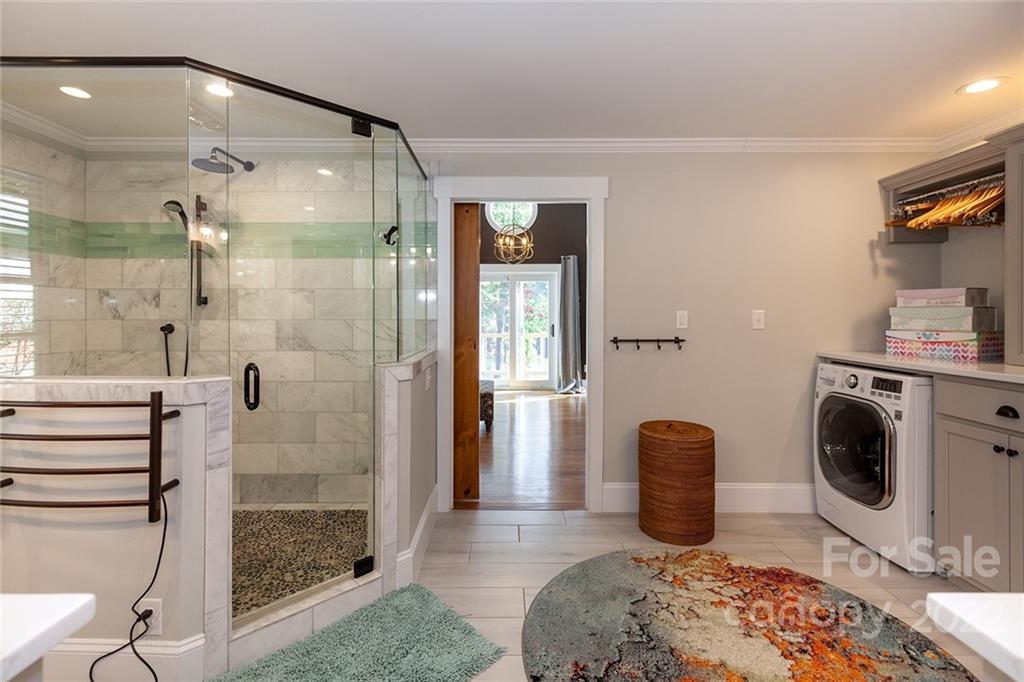 4301 Eagle Lake Drive Charlotte, NC 28217 - Photo 21 of 41 a bathroom with a sink toilet and shower