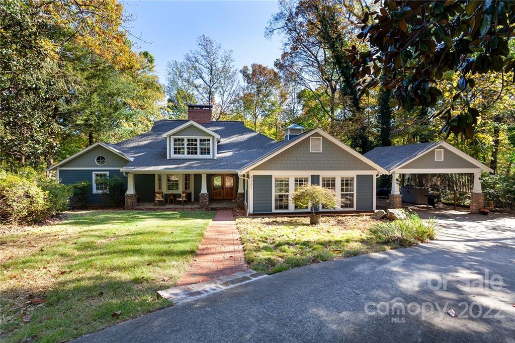 4301 Eagle Lake Drive Charlotte, NC 28217 - Photo 3 of 41 a front view of a house with a yard