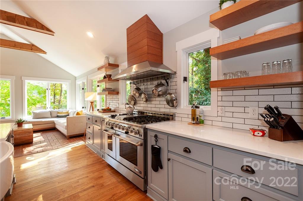 4301 Eagle Lake Drive Charlotte, NC 28217 - Photo 5 of 41 a kitchen with stainless steel appliances granite countertop a stove and a sink