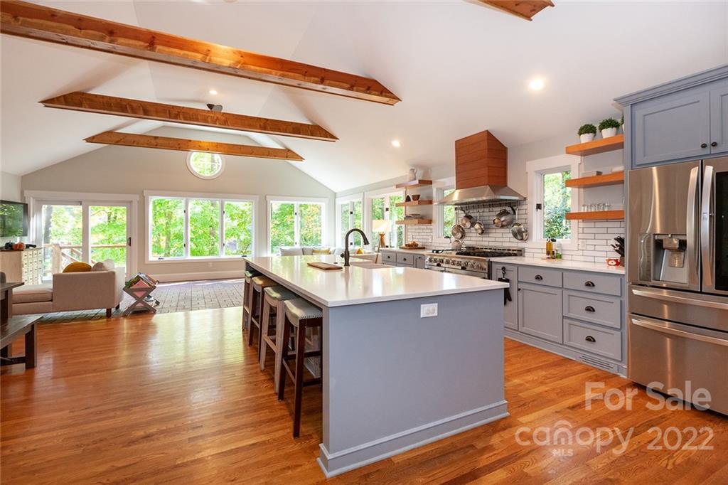 4301 Eagle Lake Drive Charlotte, NC 28217 - Photo 6 of 41 a kitchen with sink cabinets and wooden floor