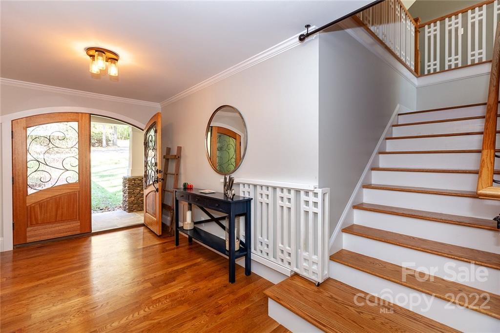 4301 Eagle Lake Drive Charlotte, NC 28217 - Photo 9 of 41 a view of a livingroom with wooden floor and furniture