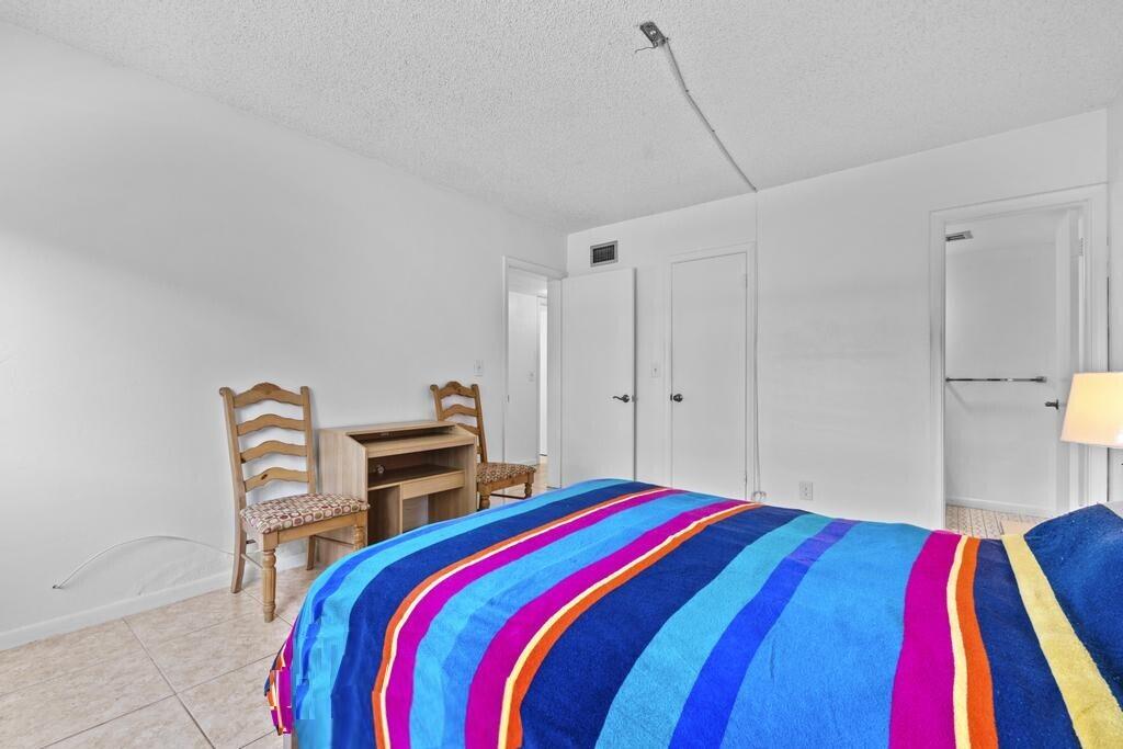 350 South Cypress Road, Unit 502 Pompano Beach, FL 33060 - Photo 22 of 36 Primary Room