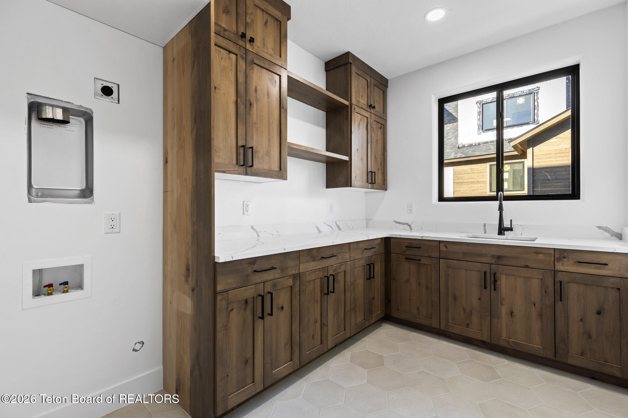 6373 Snow Goose Circle Victor, ID 83455 - Photo 50 of 59 43 laundry room