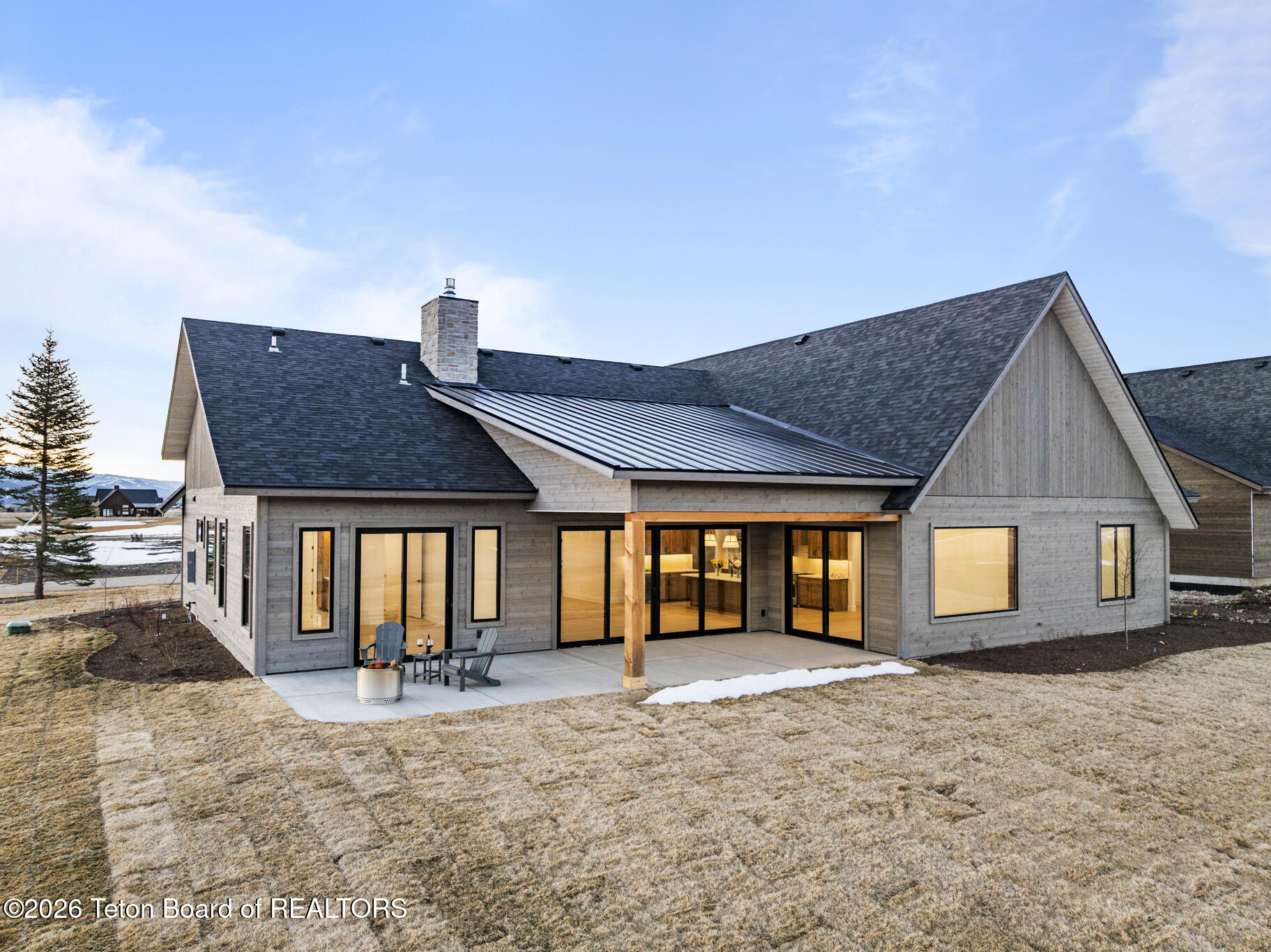 6373 Snow Goose Circle Victor, ID 83455 - Photo 56 of 59 48 Back of home evening 2