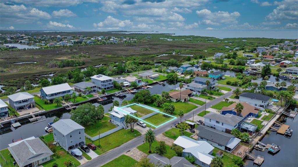 Centavo Court Brooksville, FL 34607 - Photo 3 of 10 an aerial view of residential houses with outdoor space and lake view