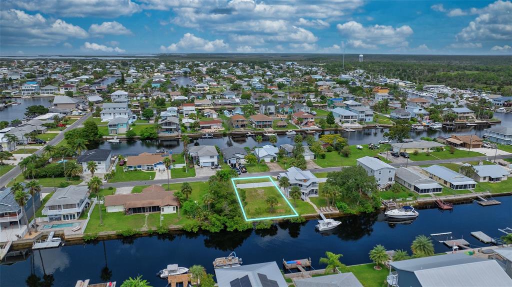 Centavo Court Brooksville, FL 34607 - Photo 7 of 10 an aerial view of residential houses with outdoor space