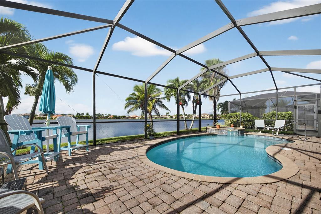 2877 Via Piazza Loop Fort Myers, FL 33905 - Photo 32 of 39 a view of a swimming pool with a patio