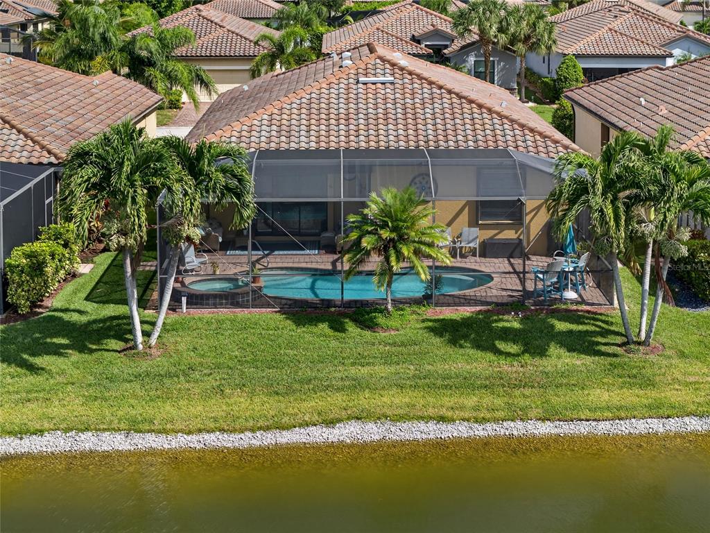 2877 Via Piazza Loop Fort Myers, FL 33905 - Photo 33 of 39 a view of a house with a yard