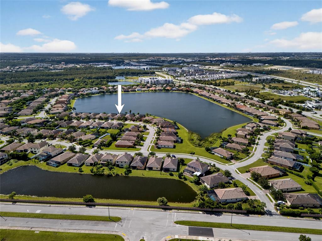 2877 Via Piazza Loop Fort Myers, FL 33905 - Photo 4 of 39 an aerial view of a city