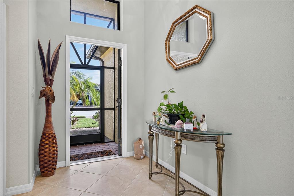 2877 Via Piazza Loop Fort Myers, FL 33905 - Photo 5 of 39 a front view of a house with entryway