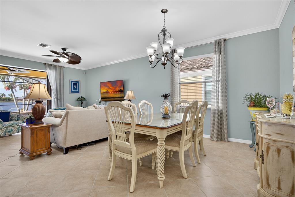2877 Via Piazza Loop Fort Myers, FL 33905 - Photo 7 of 39 a view of a dining room with furniture window and outside view